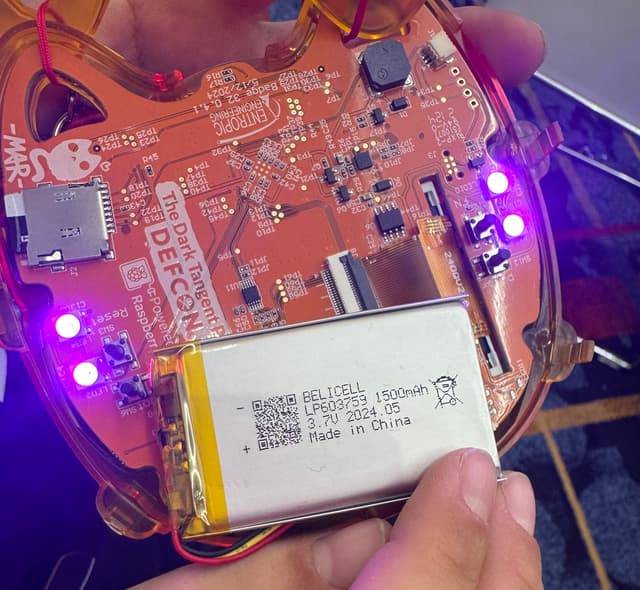 Photo of inside of a DEFCON badge